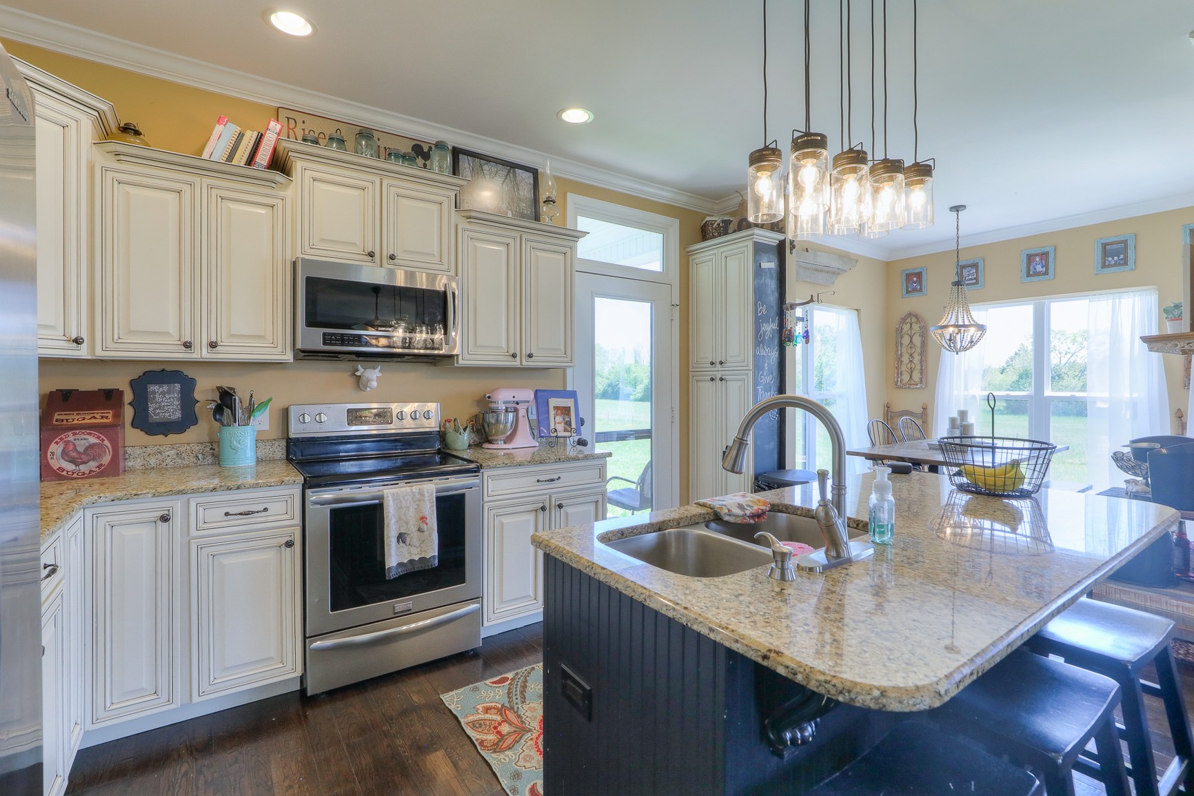405 Burford Road Lebanon, TN 37087 - Photo 9 of 44 a kitchen with kitchen island granite countertop a sink cabinets and stainless steel appliances