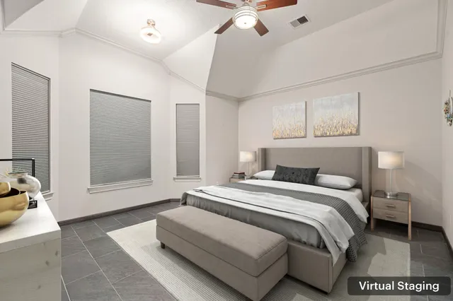 a bedroom with a bed and glass walk in closet