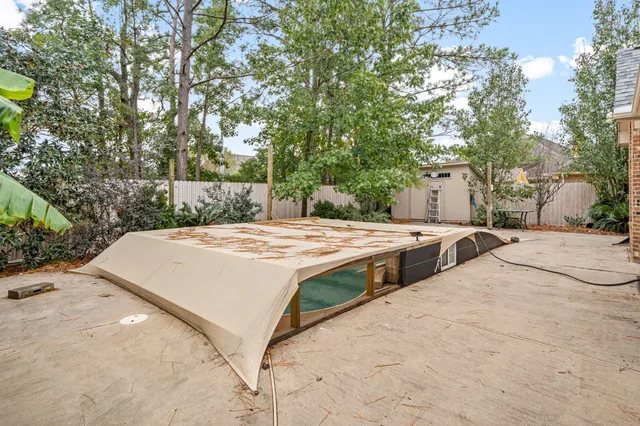 a view of backyard of a house