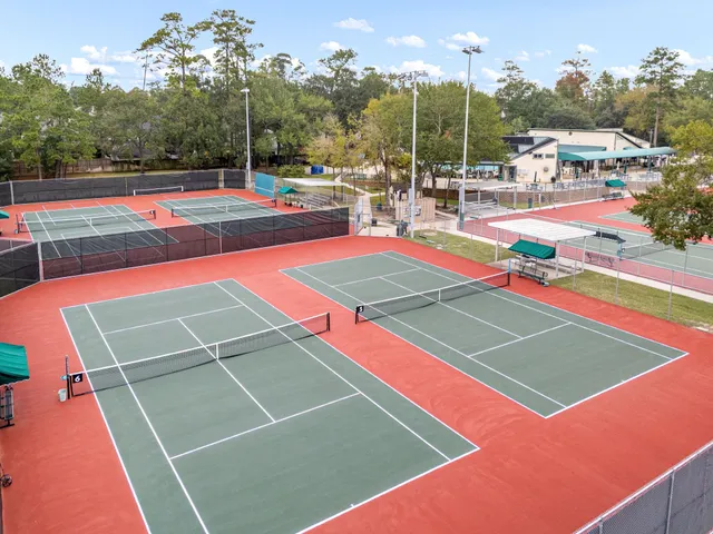 a balcony with furniture and city view