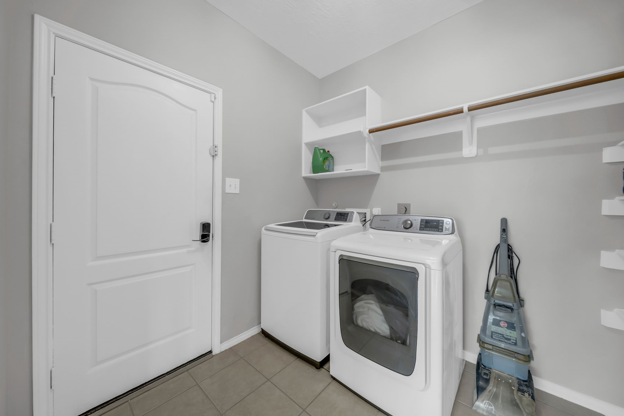 4502 Baron Road Baytown, TX 77521 - Photo 12 of 25 a utility room with dryer and washer