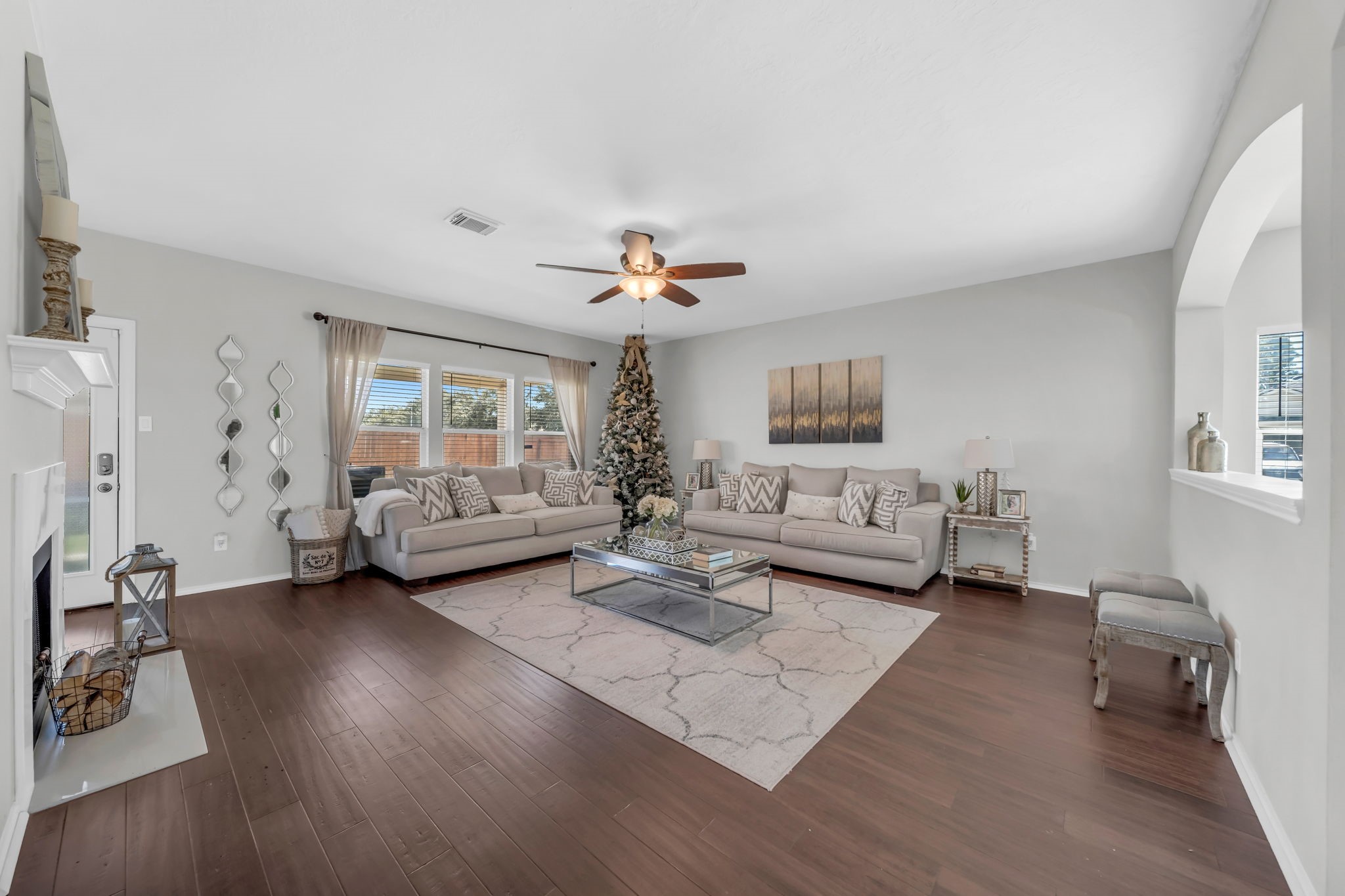 4502 Baron Road Baytown, TX 77521 - Photo 7 of 25 a living room with furniture and a wooden floor
