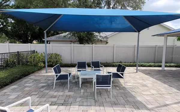 a patio view with a seating space