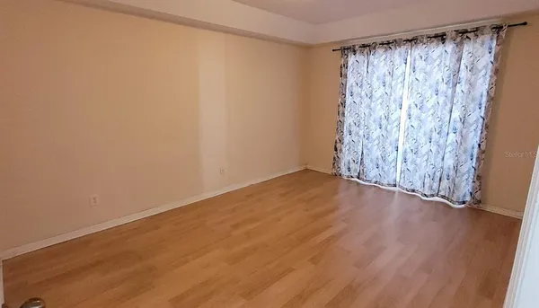 a view of a room with wooden walls