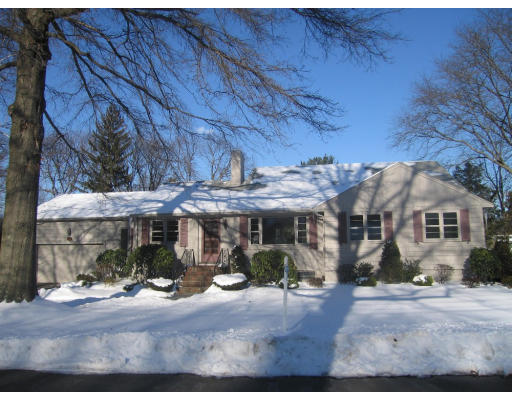 34 Webster Road Lexington, MA 02421 - Photo 1 of 12 a view of a house with a patio