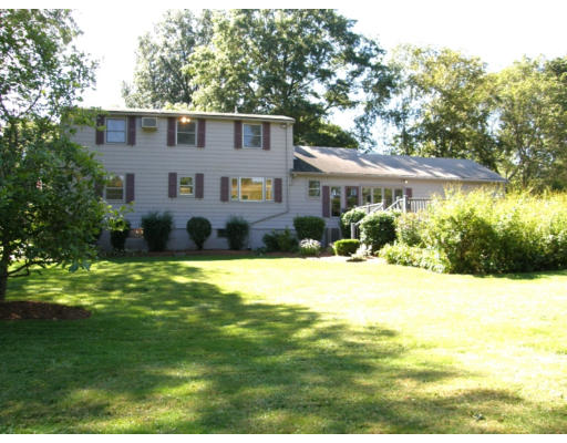 34 Webster Road Lexington, MA 02421 - Photo 12 of 12 a view of a house with a yard