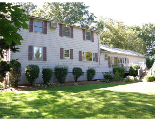 34 Webster Road Lexington, MA 02421 - Photo 2 of 12 a front view of a house with a yard