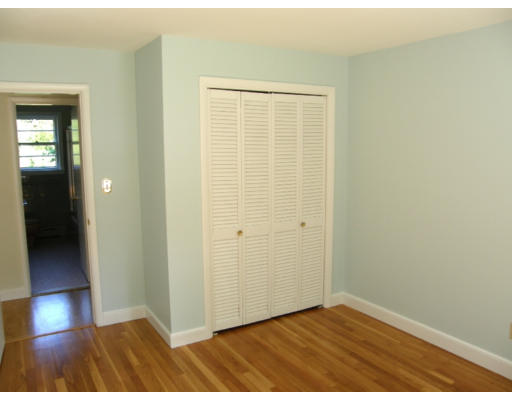 34 Webster Road Lexington, MA 02421 - Photo 9 of 12 a view of an empty room with closet and a window