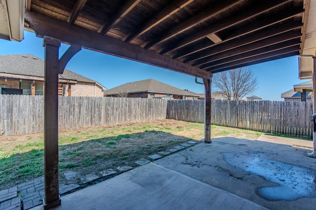 2005 Ridgeview Court Sanger, TX 76266 - Photo 17 of 20 a view of a backyard with barn
