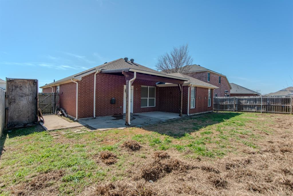 2005 Ridgeview Court Sanger, TX 76266 - Photo 19 of 20 a view of a house with a yard and large tree