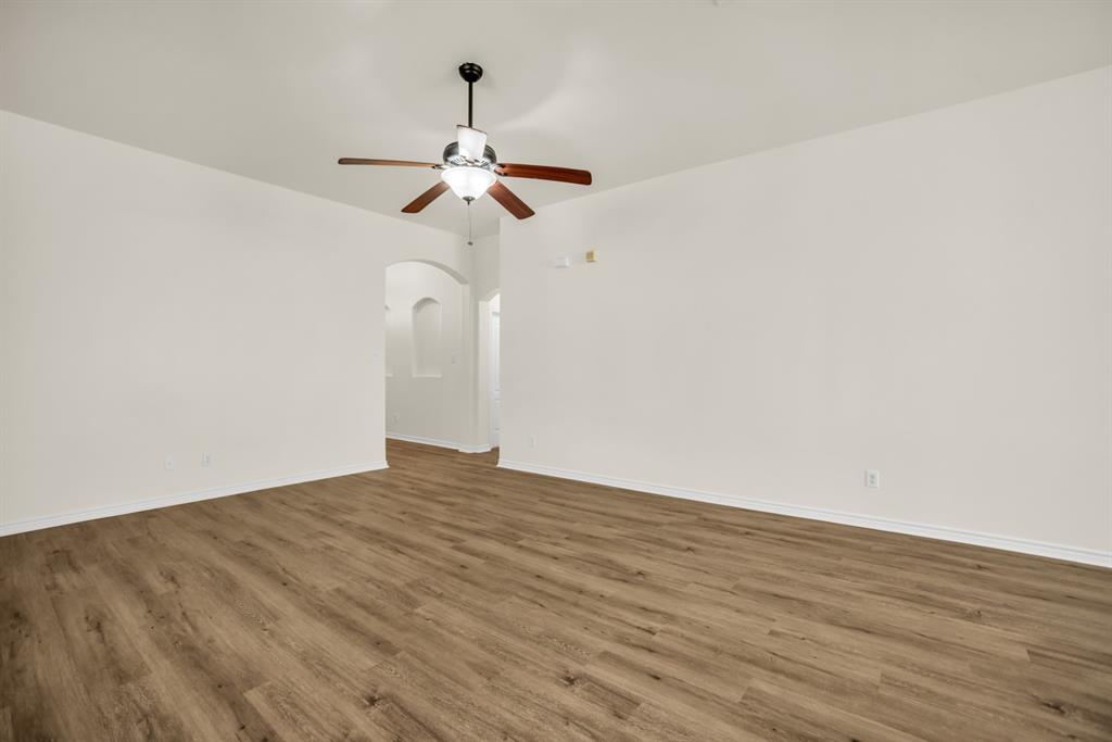 2005 Ridgeview Court Sanger, TX 76266 - Photo 3 of 20 a view of empty room with wooden floor