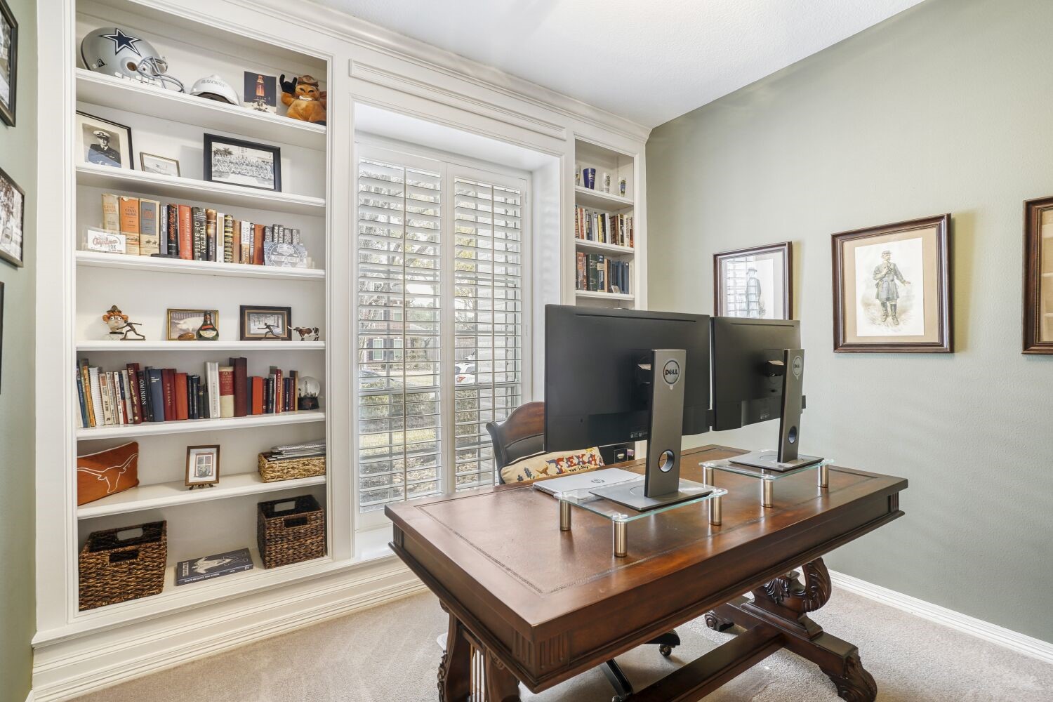 5308 Mountain Grove Court Spring, TX 77379 - Photo 21 of 31 This cozy home office features built-in bookshelves, a large window with shutters providing natural light, creating a perfect workspace.