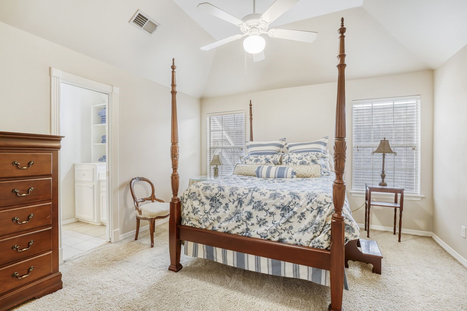 5308 Mountain Grove Court Spring, TX 77379 - Photo 28 of 31 This spacious upstairs bedroom features tall ceilings and two large windows, creating an airy, light-filled retreat. With direct access to the shared Jack and Jill bathroom, it combines comfort and convenience.