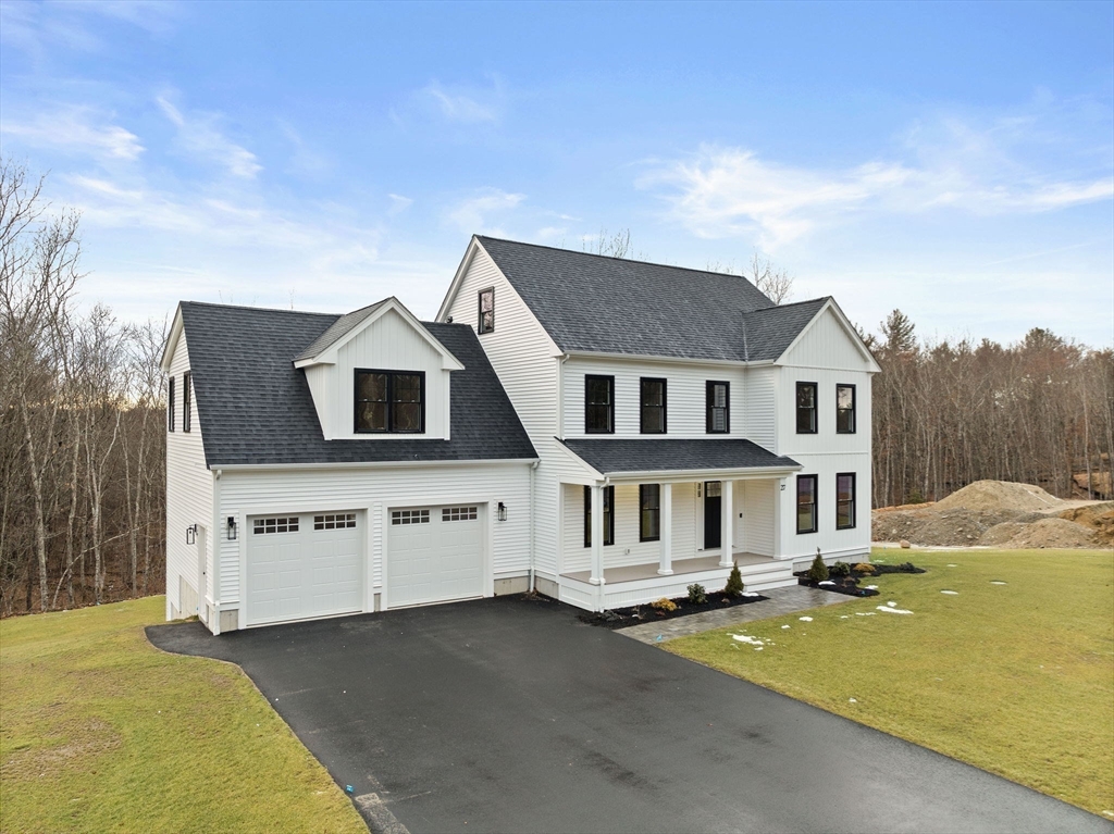 a view of a house with roof deck