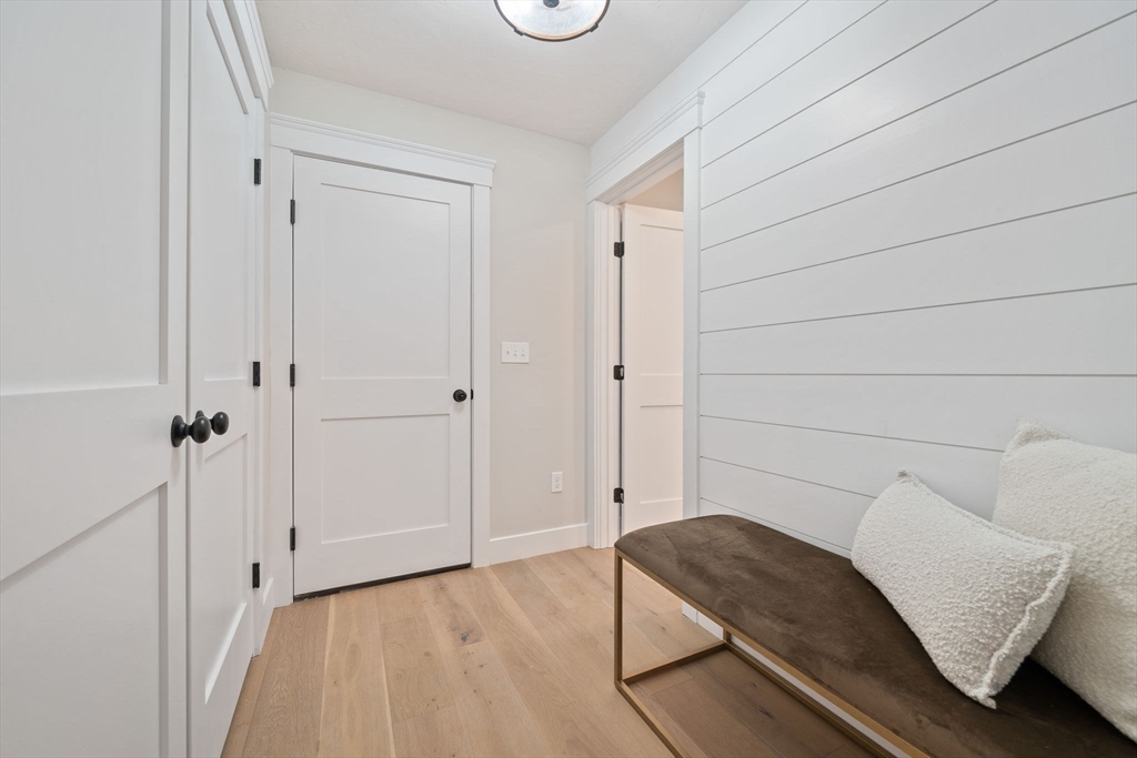 27 Caleb Drive Middleboro, MA 02346 - Photo 14 of 42 a living room with furniture and a gate