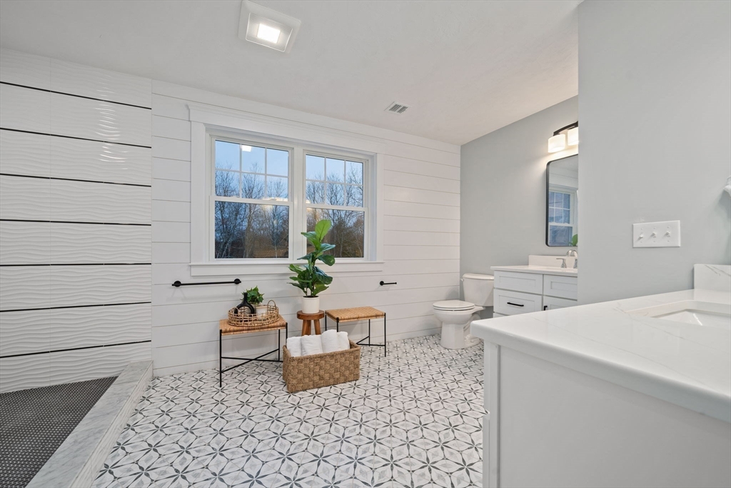 27 Caleb Drive Middleboro, MA 02346 - Photo 21 of 42 a living room with furniture and next to a window