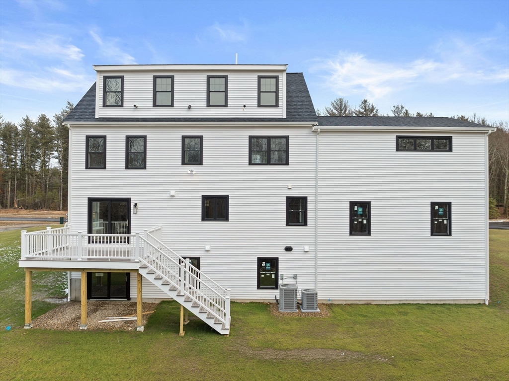 27 Caleb Drive Middleboro, MA 02346 - Photo 35 of 42 a house view with a garden space