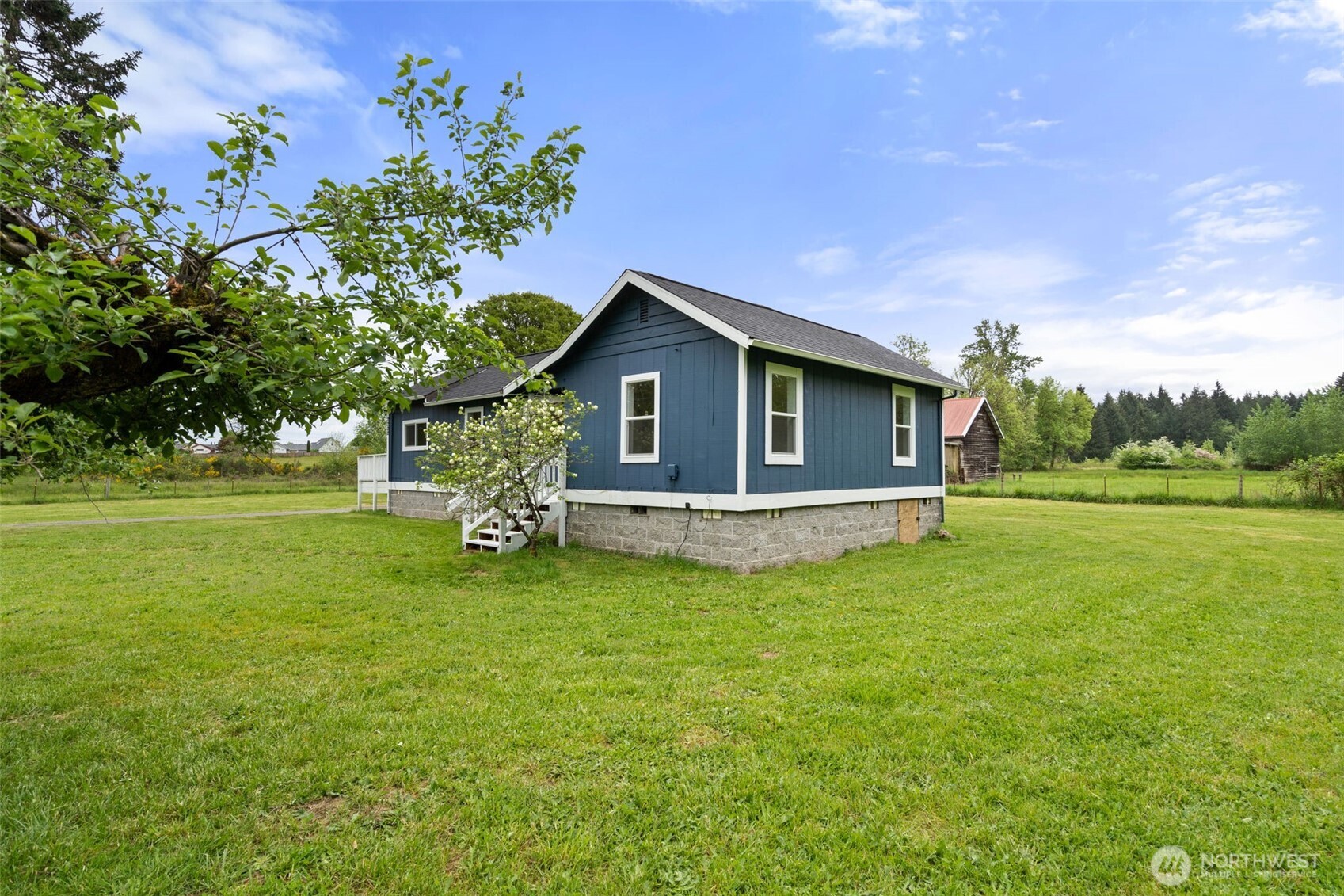 2222 Cooks Hill Road Centralia, WA 98531 - Photo 27 of 36 a view of a house with a backyard