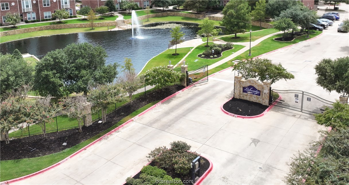 1198 Jones-Butler Road, Unit 1403 College Station, TX 77840 - Photo 13 of 20 a view of swimming pool with a patio and garden