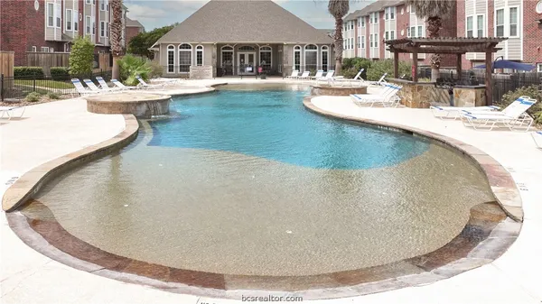 a view of a house with swimming pool