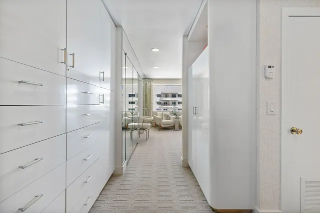 a view of a hallway view with staircase