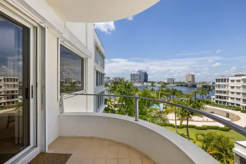 a view of a balcony with city view