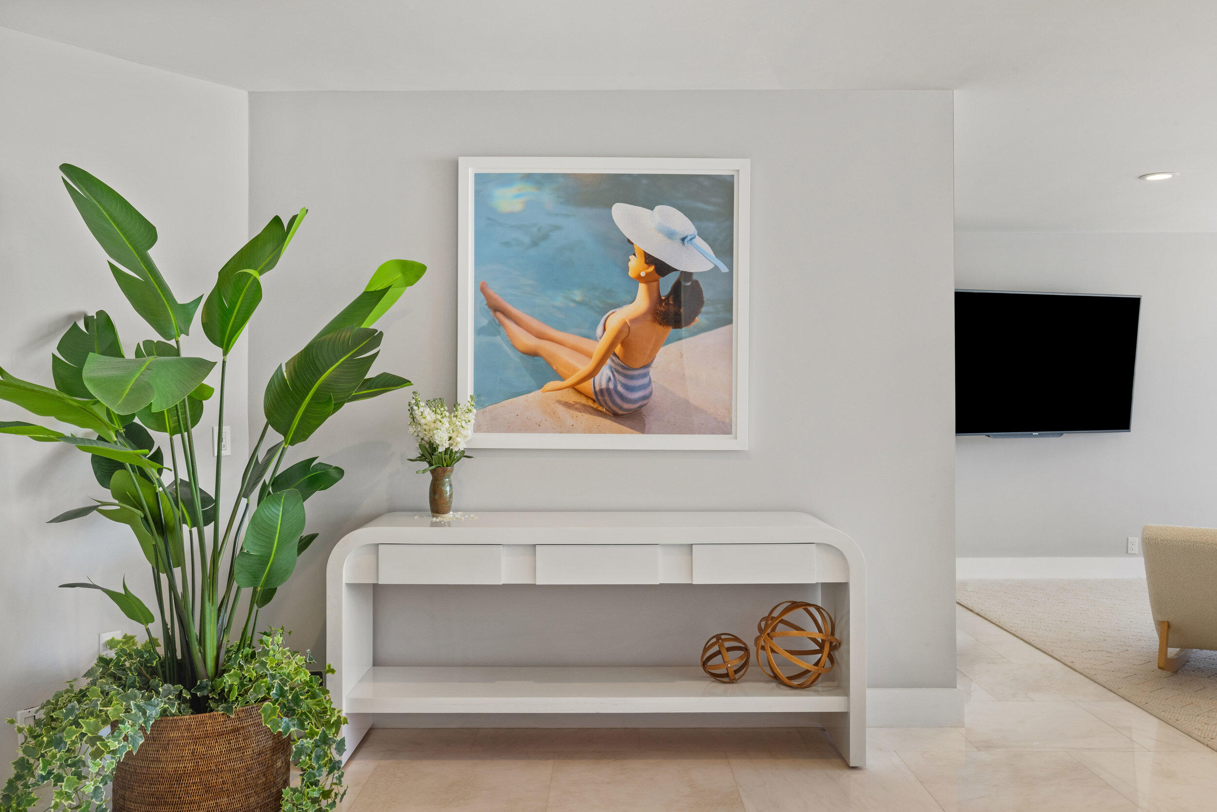 44 Cocoanut Row, Unit 510/511 B Palm Beach, FL 33480 - Photo 3 of 24 a living room with furniture and a potted plant