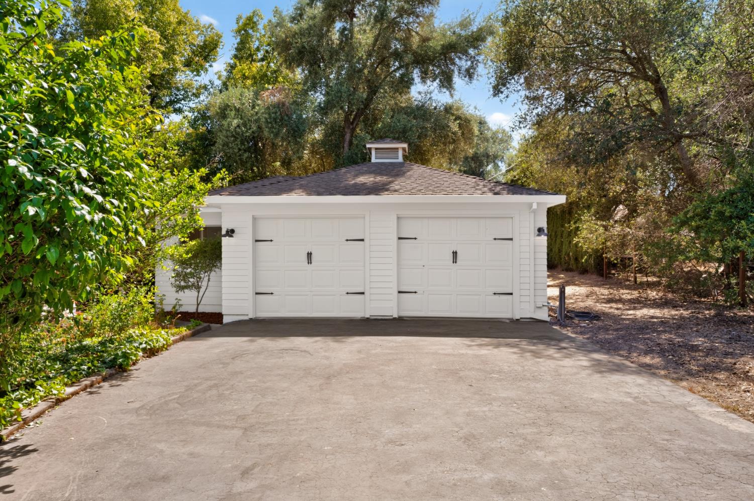 4335 Walnut Avenue Sacramento, CA 95821 - Photo 8 of 62 Detached two-car garage with generous driveway parking for guests.