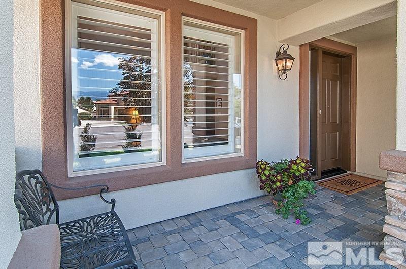 585 Magistrate Court Reno, NV 89521 - Photo 2 of 22 a front view of a house and a entryway