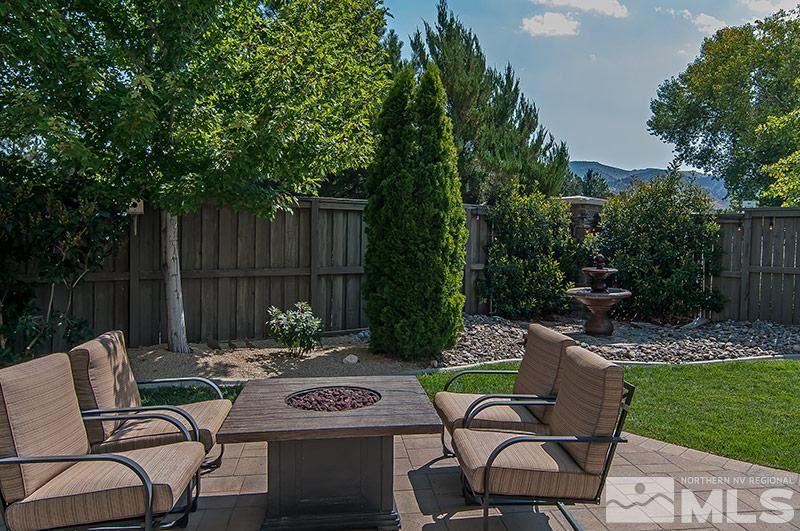 585 Magistrate Court Reno, NV 89521 - Photo 21 of 22 a view of a chairs and table in patio next to a yard