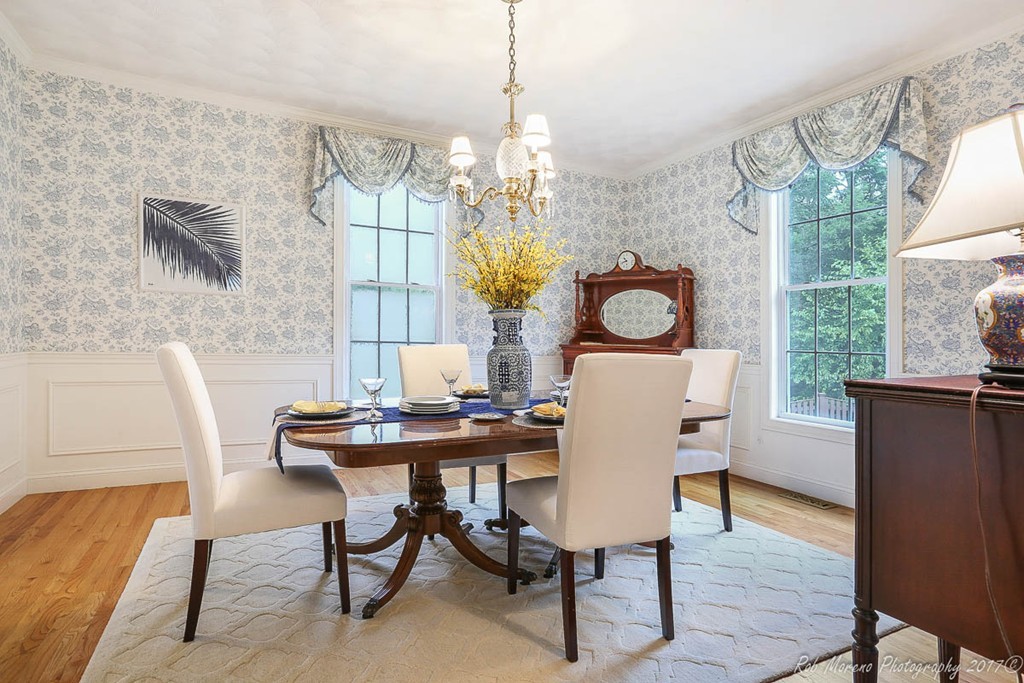 7 Onion River Road Wenham, MA 01984 - Photo 5 of 29 a view of a dining room with furniture a chandelier and wooden floor
