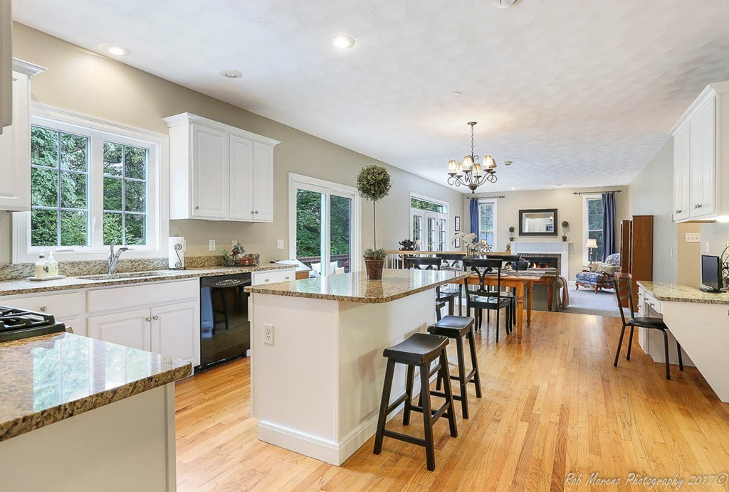 7 Onion River Road Wenham, MA 01984 - Photo 8 of 29 a kitchen with lots of counter and chairs