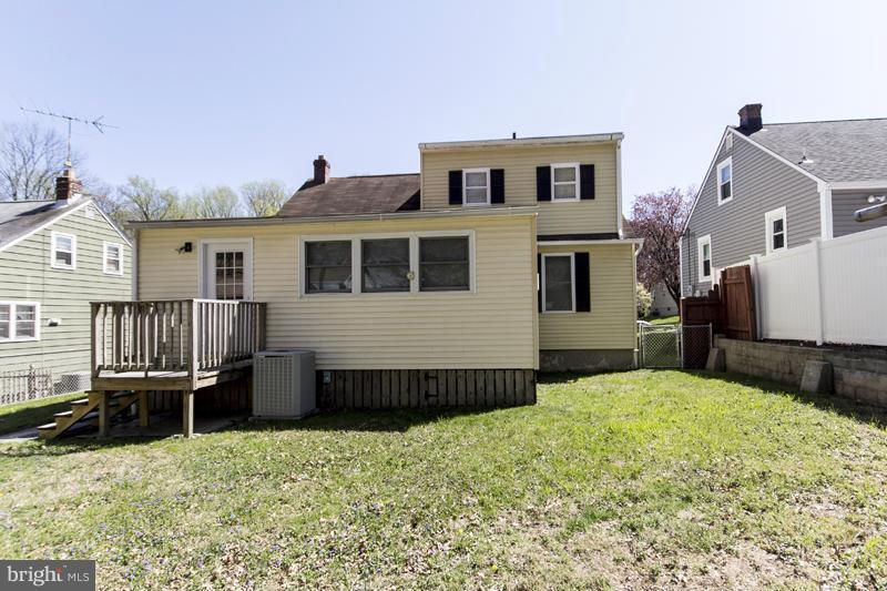 1824 Berrywood Road Baltimore, MD 21234 - Photo 21 of 23 Sunroom Exit to Fenced Rear Yard