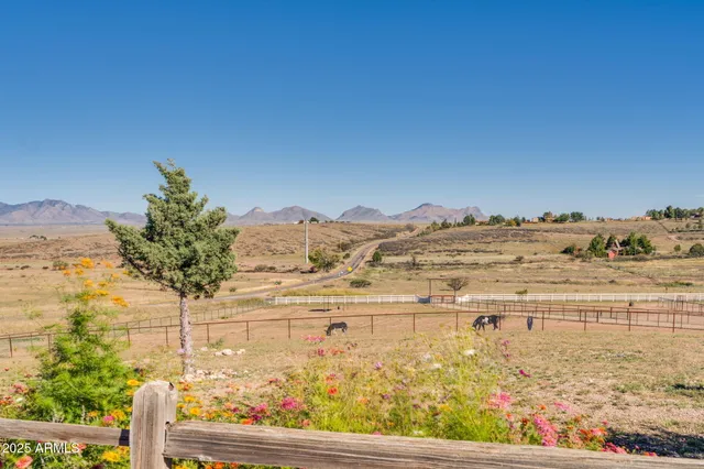 a living room with fireplace furniture and a flat screen tv
