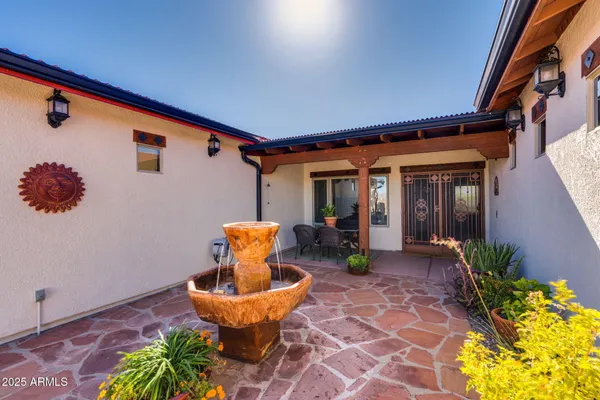a kitchen with stainless steel appliances granite countertop a stove microwave and refrigerator
