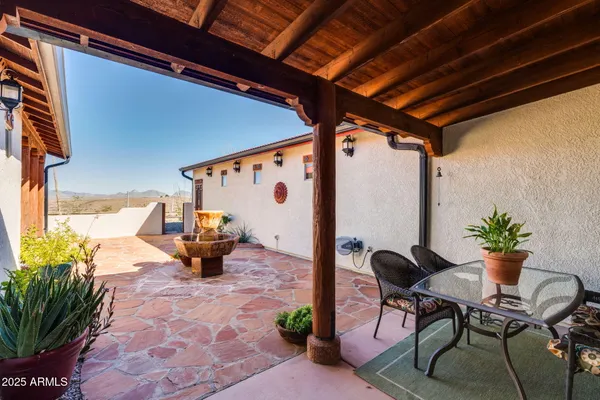 a bedroom with a bed dresser and a window