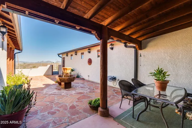 a bedroom with a bed dresser and a window