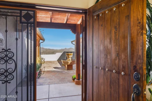 a living room with furniture cabinets and a book shelf