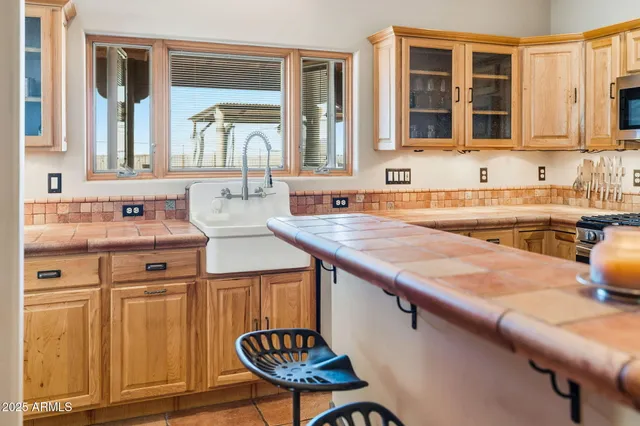 a view of a backyard of the house