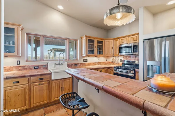 a backyard of a house with wooden fence