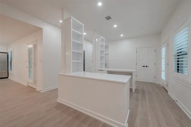a view of kitchen with wooden floor