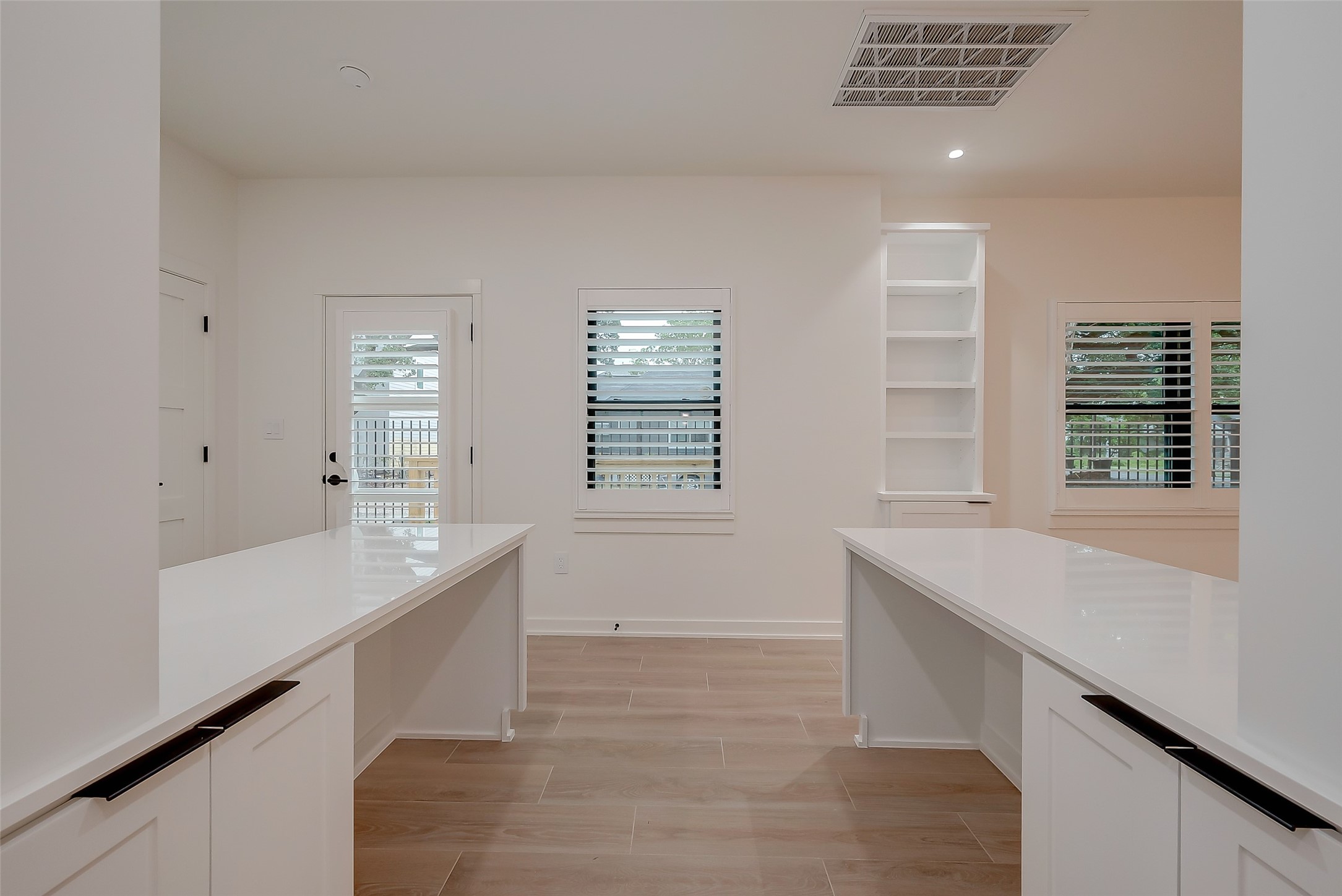 2702 Delano Street Houston, TX 77004 - Photo 13 of 45 a room with a large counter top and natural light