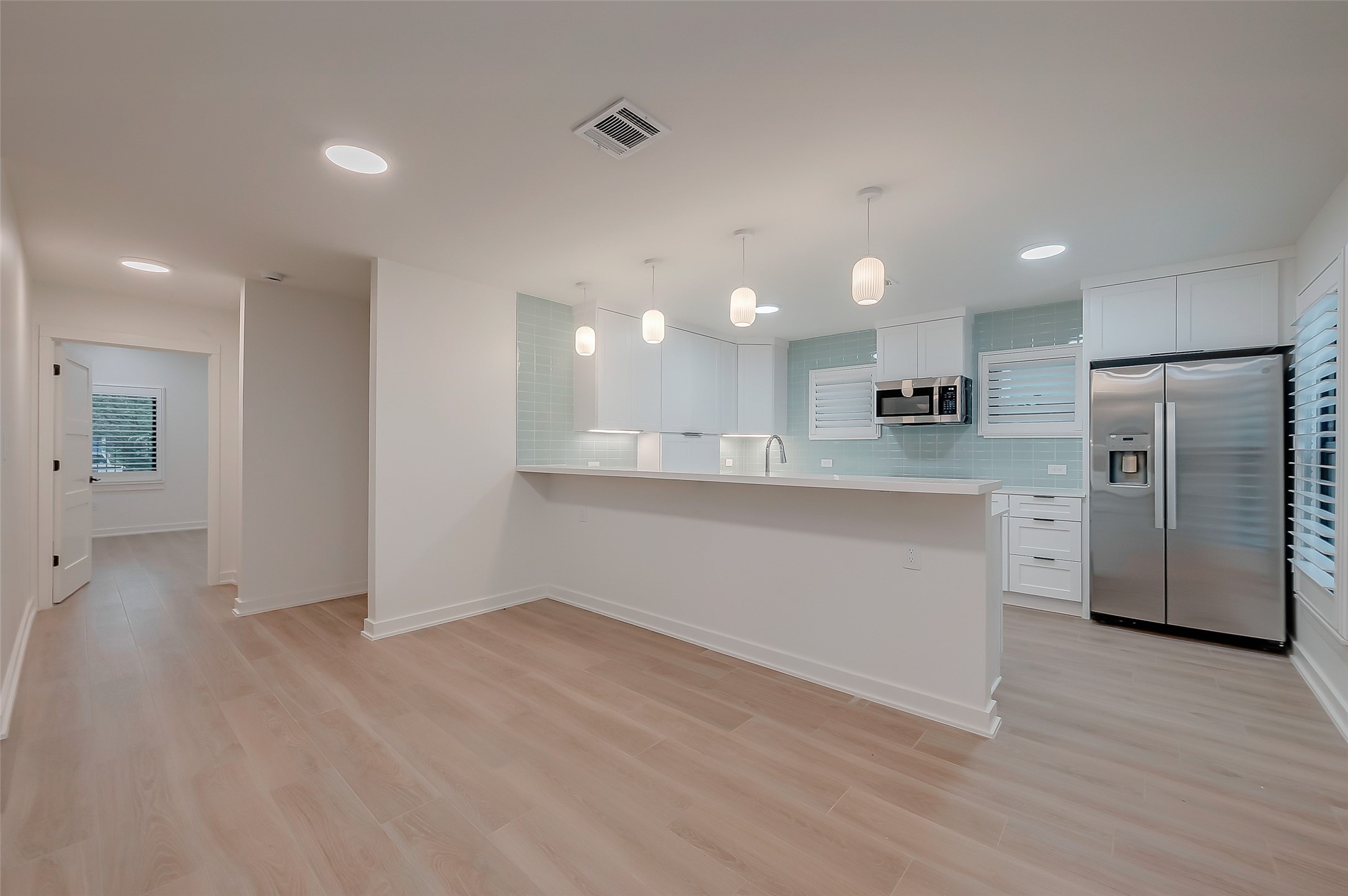 2702 Delano Street Houston, TX 77004 - Photo 16 of 45 a view of kitchen with wooden floor