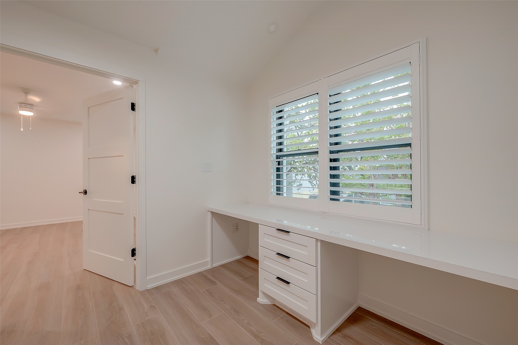 2702 Delano Street Houston, TX 77004 - Photo 25 of 45 a room with window and cabinet