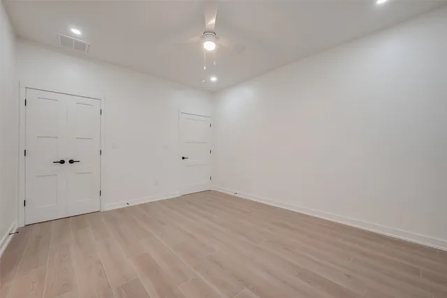 a bathroom with a sink toilet and mirror