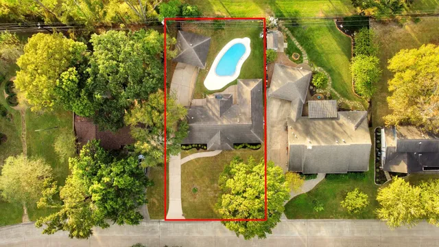 a view of a house with a park