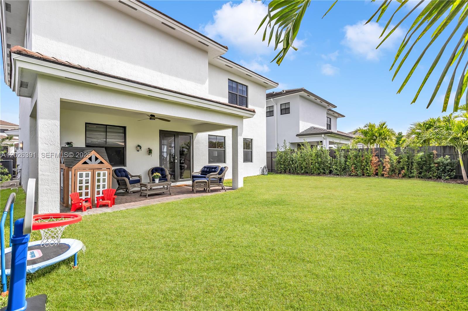 14606 Southwest 22nd Terrace Miami, FL 33175 - Photo 25 of 43 a view of a house with backyard porch and furniture