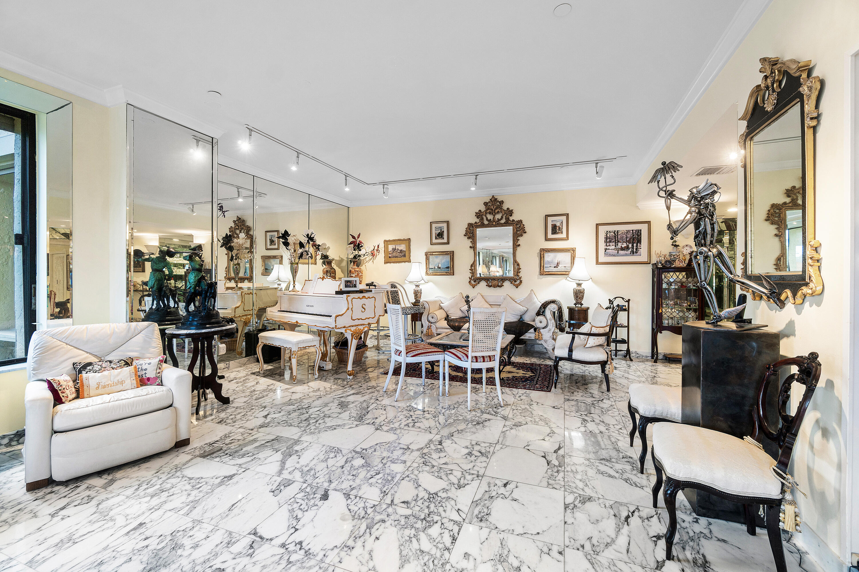 150 Bradley Place, Unit 101 Palm Beach, FL 33480 - Photo 13 of 38 a living room with furniture and wooden floor