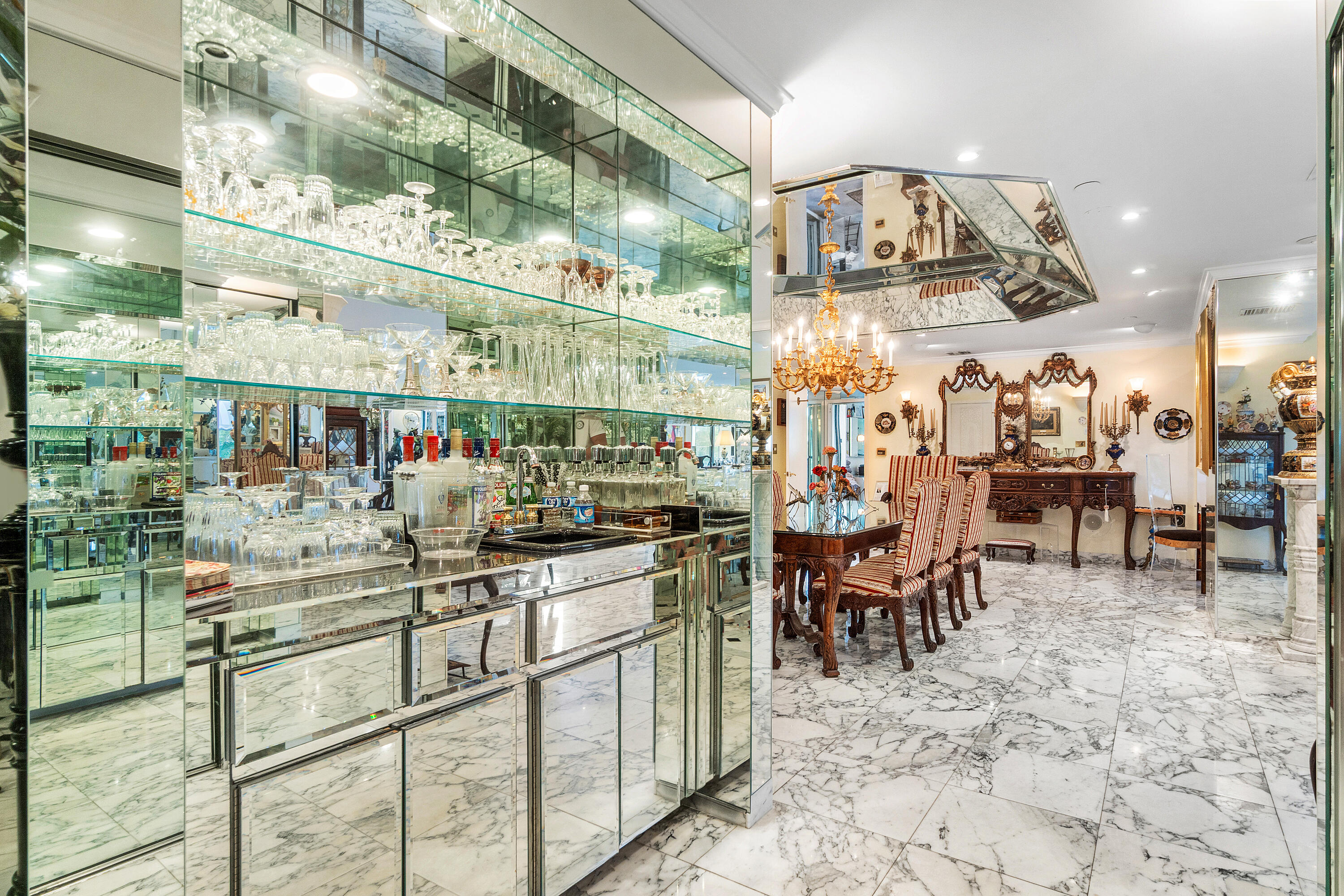 150 Bradley Place, Unit 101 Palm Beach, FL 33480 - Photo 17 of 38 a view of a dining area with furniture