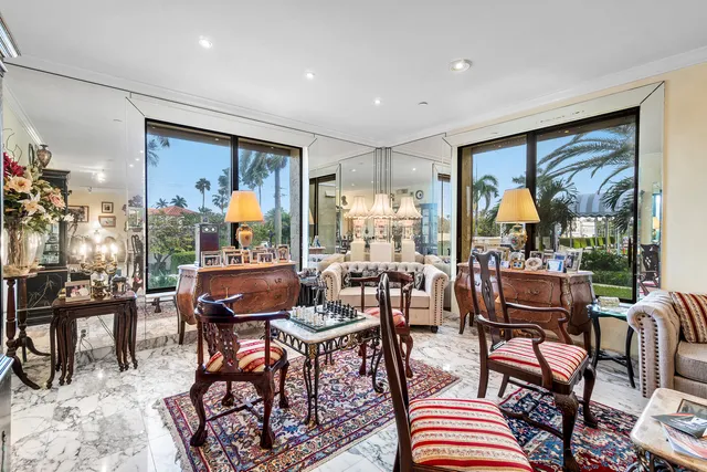 a living room with lots of furniture and lots of furniture